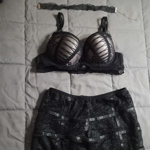 FREDERICKS OF HOLLYWOOD bra and high waisted lace skirt with garters